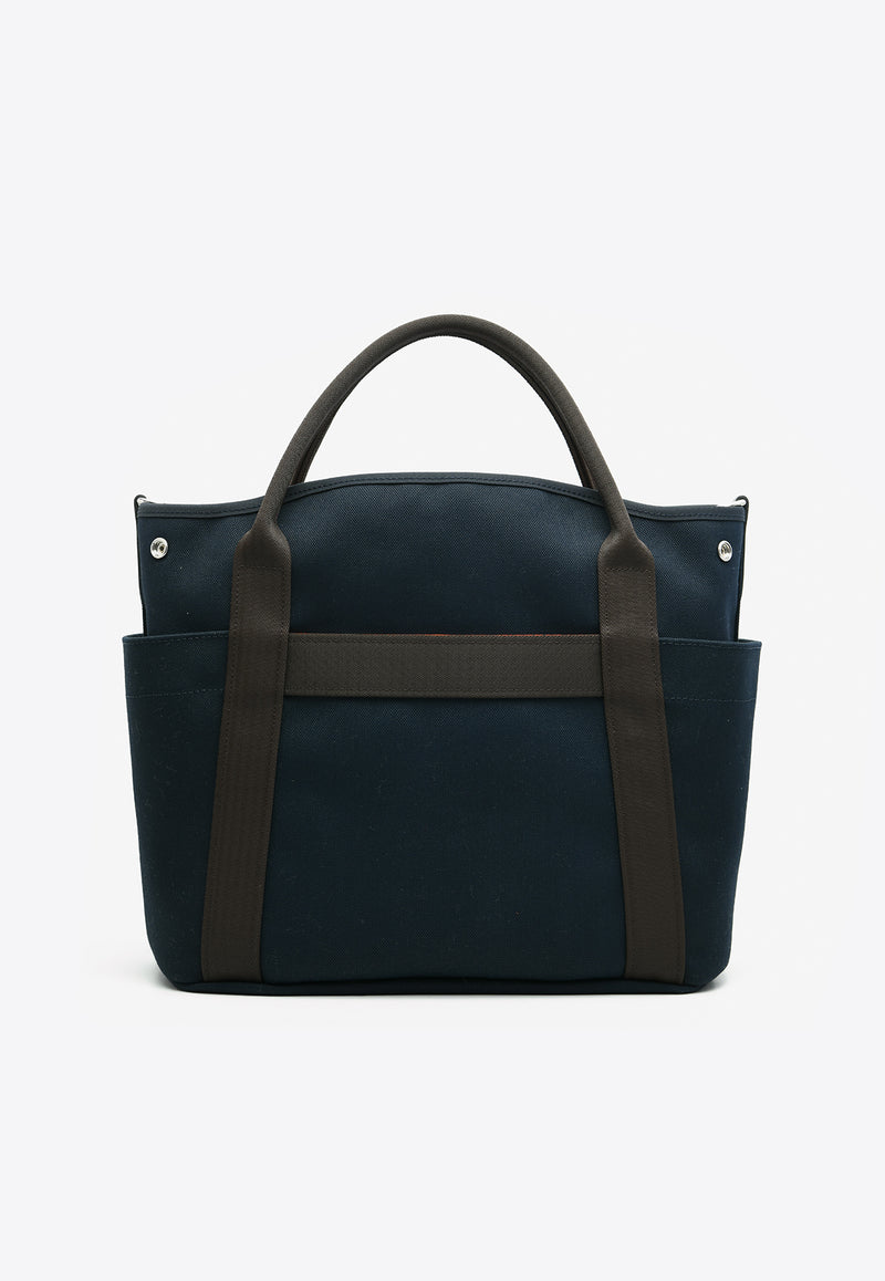 Hermès The Grooming Bag in Bleu Navy Canvas and Feu Barenia Leather TGBBNCFBL