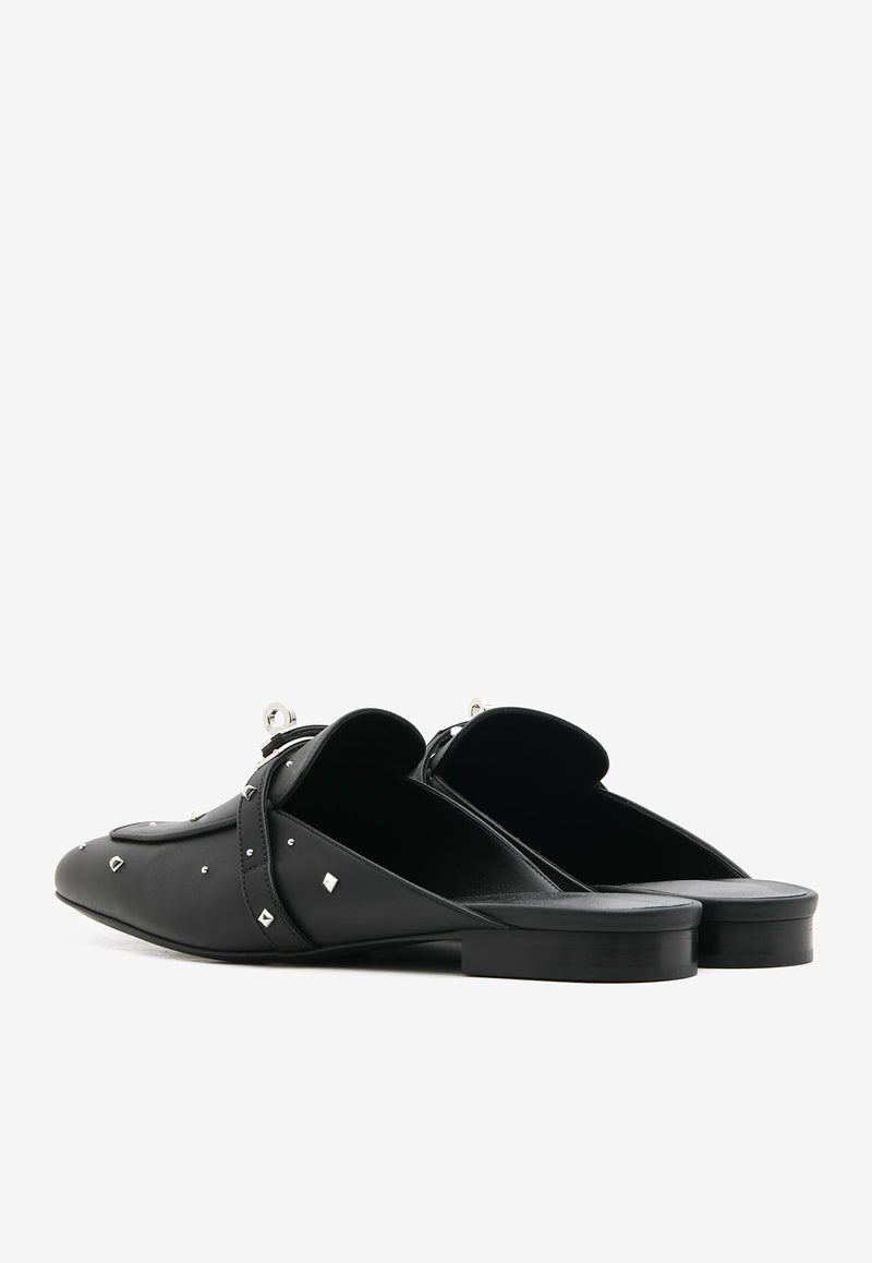 Hermès Oz Flat Mules in Black Calfskin with Medor Studs and Palladium Kelly Buckle