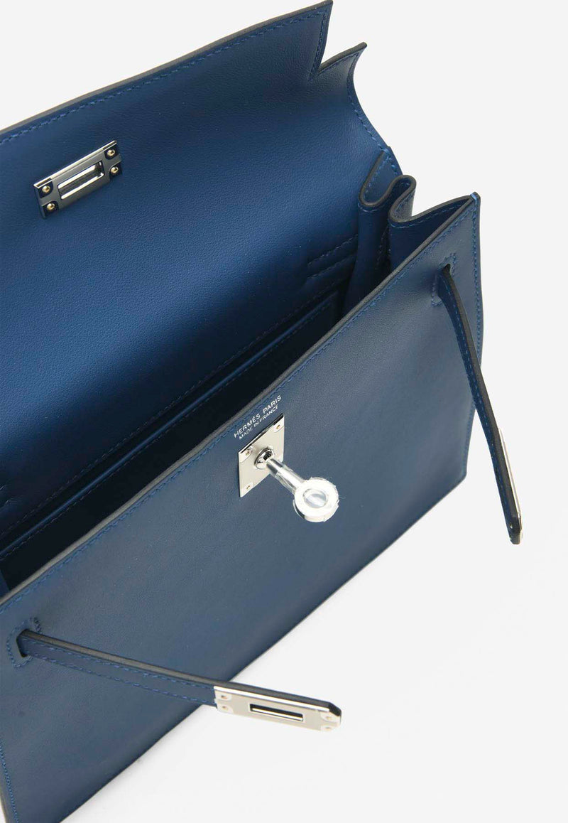 Kelly Danse in Bleu Tie Swift with Palladium Hardware