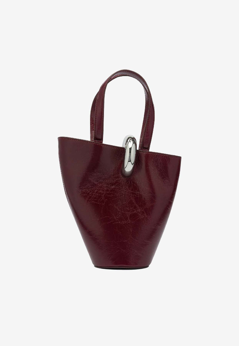 Jacquemus Le Petite Bambola Asymmetric Bag Bordeaux 25HBAW00389AC20C01490_45594805-8b8e-45b5-a6bf-6711c241d4b6