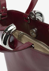 Jacquemus Le Petite Bambola Asymmetric Bag Bordeaux 25HBAW00389AC20C01490_45594805-8b8e-45b5-a6bf-6711c241d4b6
