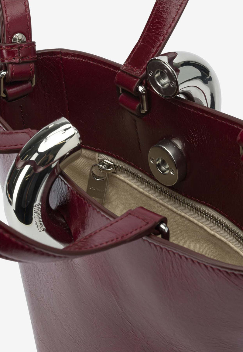 Jacquemus Le Petite Bambola Asymmetric Bag Bordeaux 25HBAW00389AC20C01490_45594805-8b8e-45b5-a6bf-6711c241d4b6