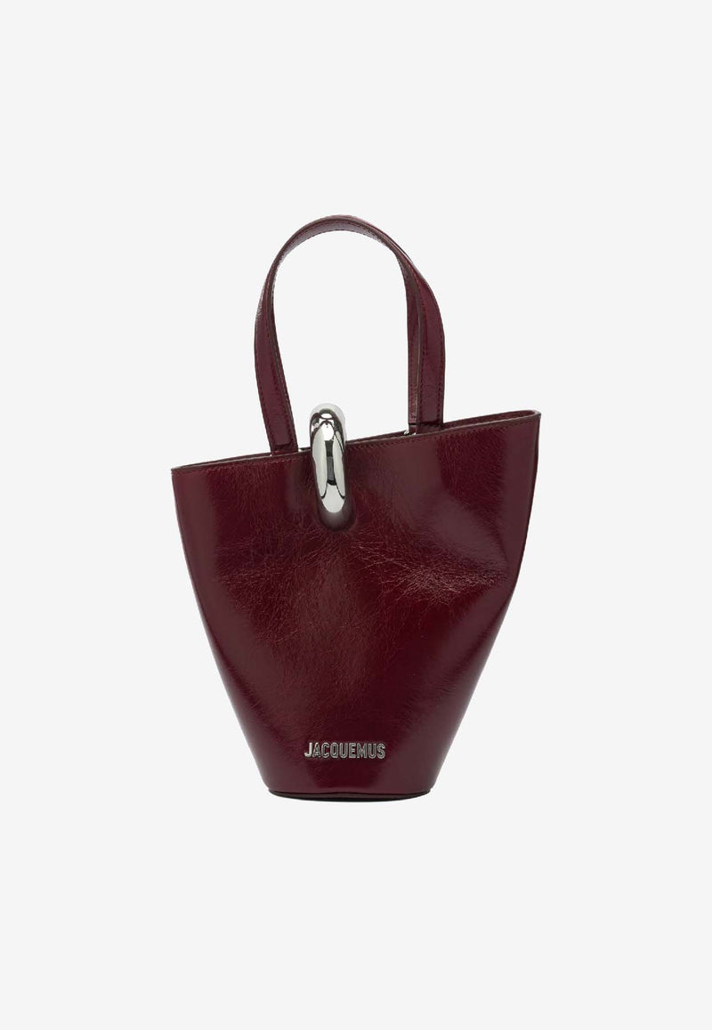 Jacquemus Le Petite Bambola Asymmetric Bag Bordeaux 25HBAW00389AC20C01490_45594805-8b8e-45b5-a6bf-6711c241d4b6