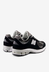New Balance 2002R Low-Top Sneakers in Black/Castlerock M2002RXD